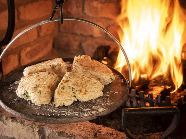 Soda on fire griddle close up